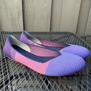 Rothy’s flats in women’s size 11 in a purple/fuchsia color. Very flexible